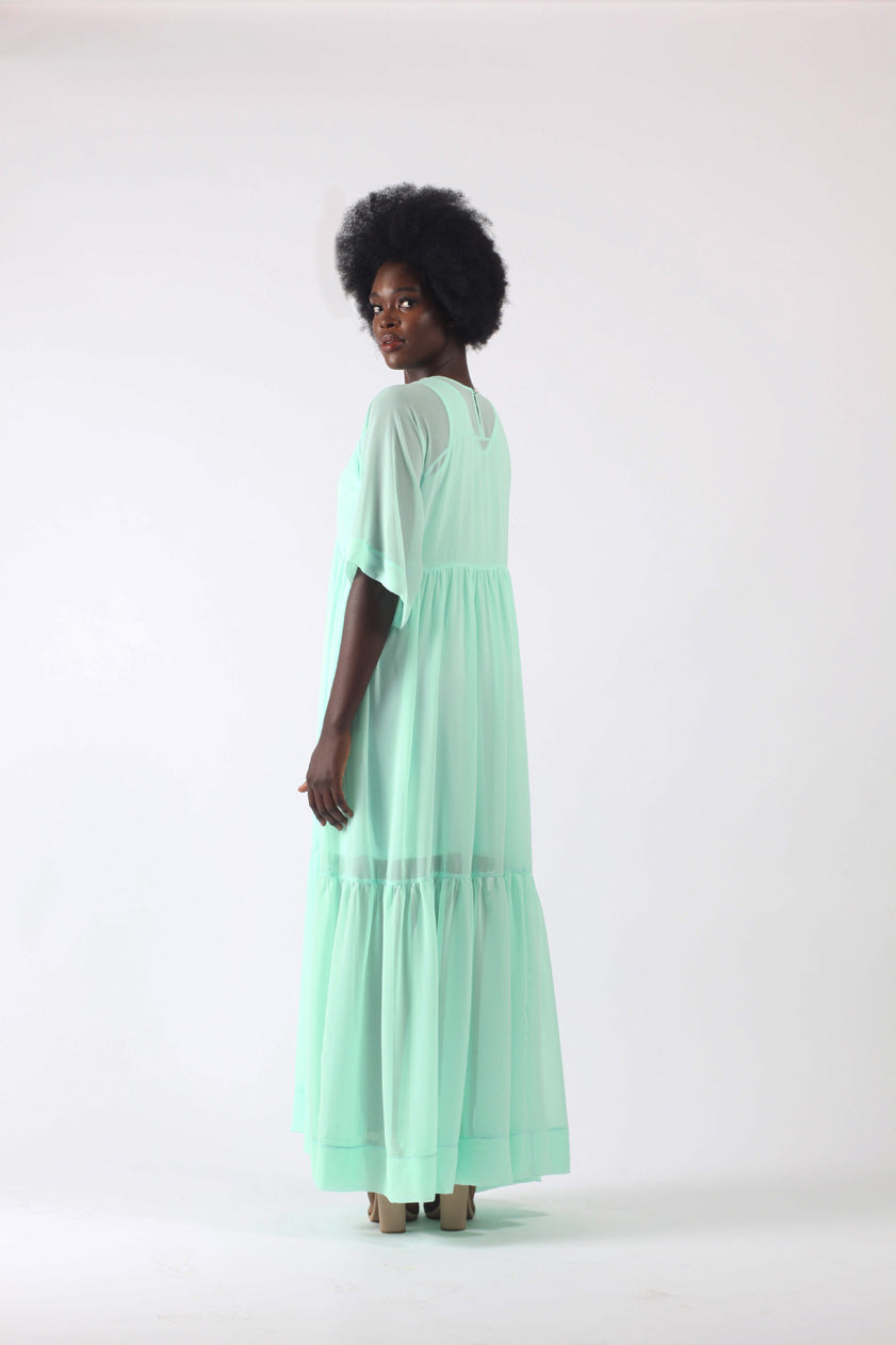Back view of Shollyjaay's maxi dress in mint colour