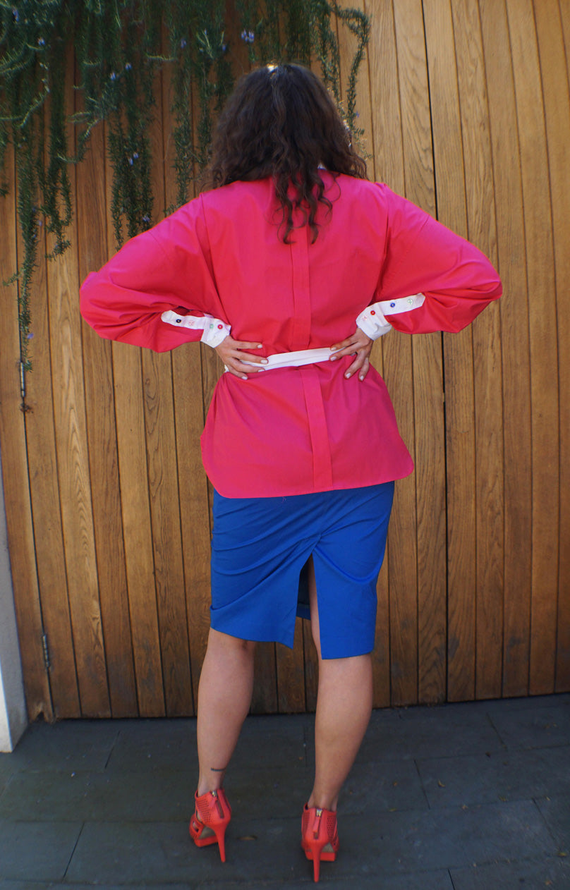 bright pink loose fit shirt with multi-coloured buttons 